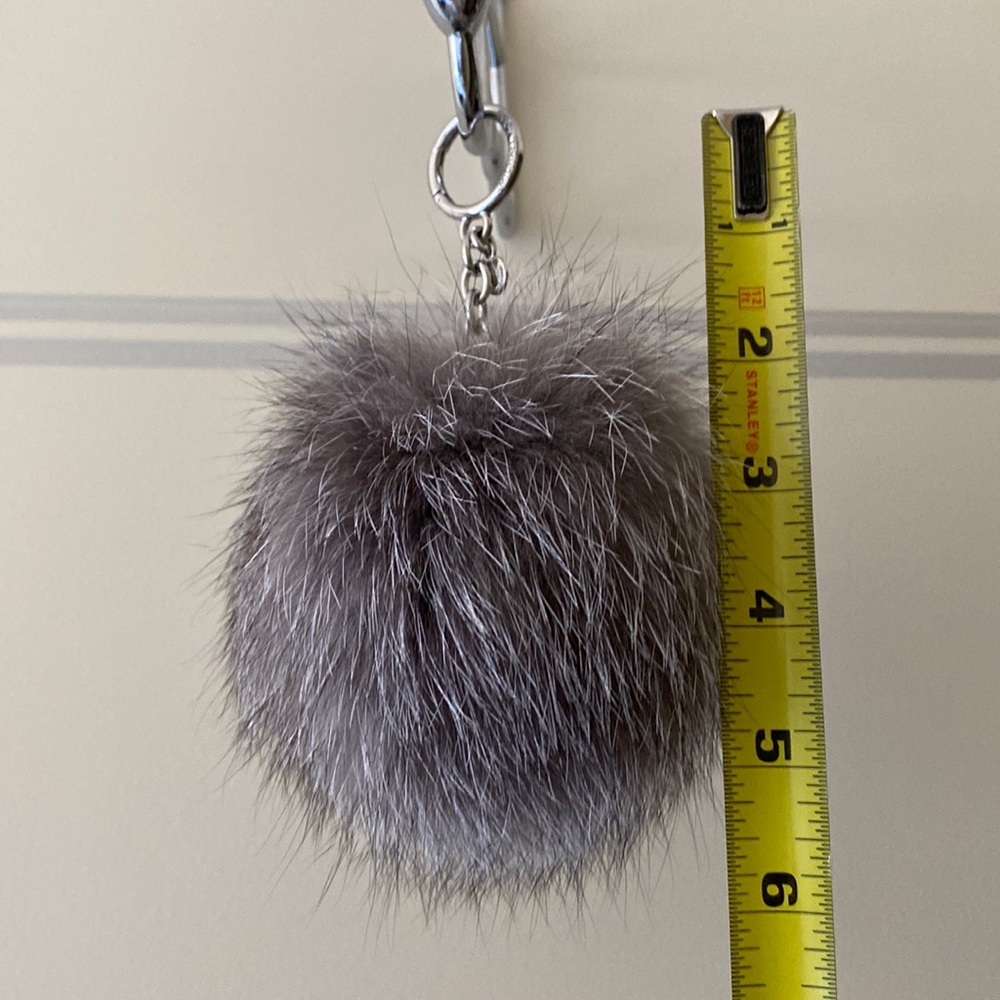 Michael Kors Pom in all gray with white accents.